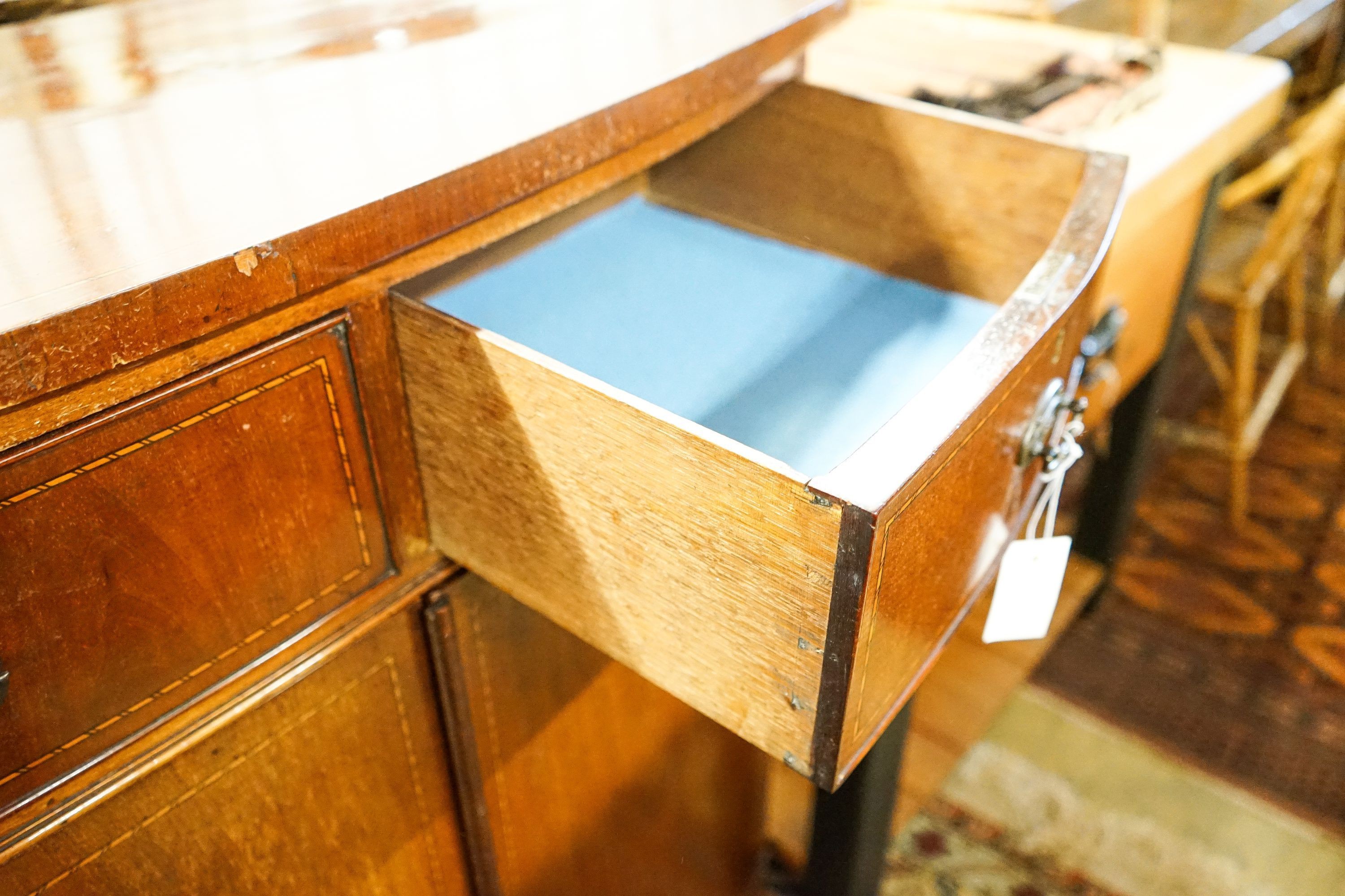 An Edwardian mahogany bowfront side cabinet, width 92cm, depth 47cm, height 113cm